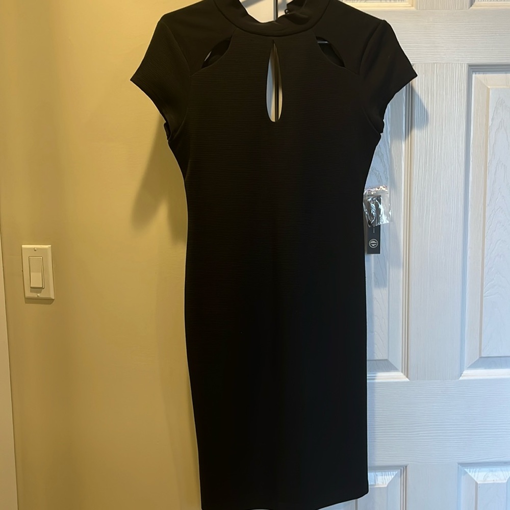 Stretchy black dress by As U Wish.